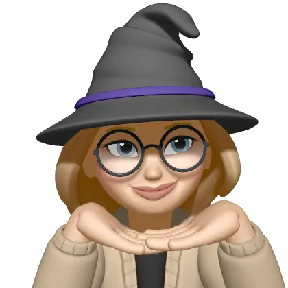 Witchy Elyse smiling with her Witch Hat